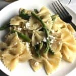 plate of asparagus goat cheese pasta.