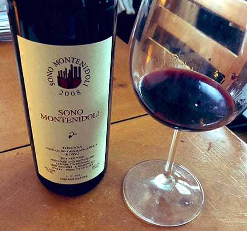 Bottle and glass of Sono Montenidoli Tuscan Sangiovese.