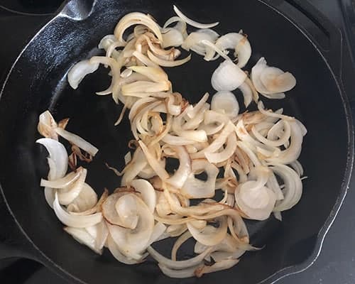 caramelizing onion in a skillet. 
