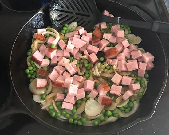 ham, peas and onion in a skillet.