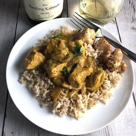 Indian butter chicken served with Riesling wine.