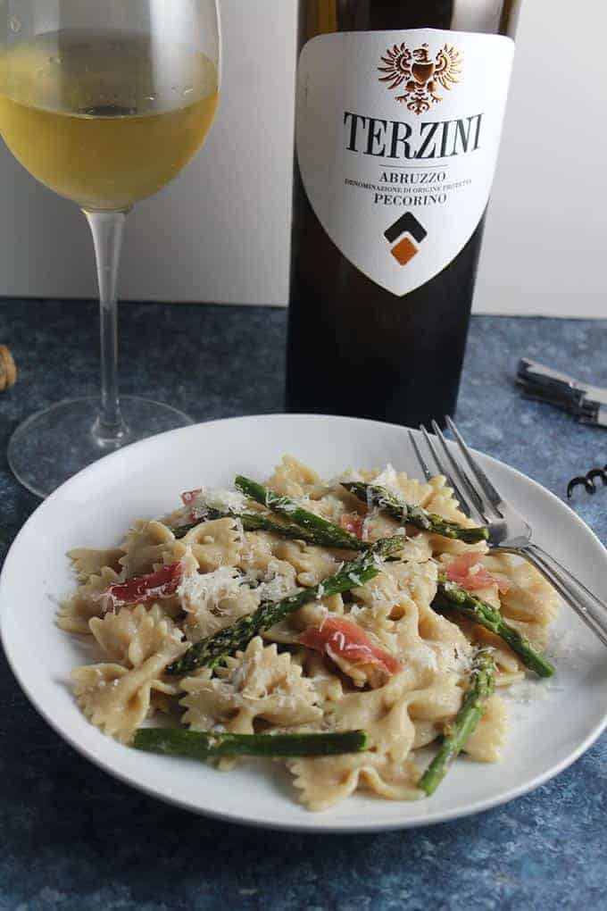 plated of roasted asparagus pasta with wine pairing.