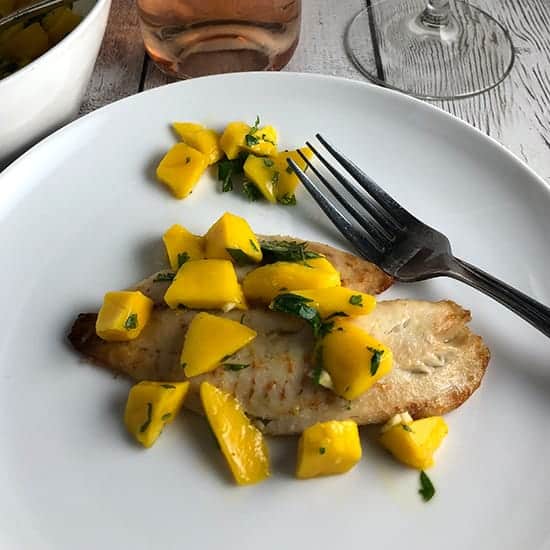 tilapia topped with mango salsa.