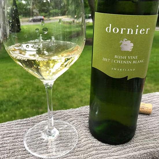 Bottle and glass of Dornier Chenin Blanc.