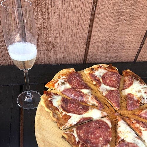 Prosecco Superiore paired with salame pizza.