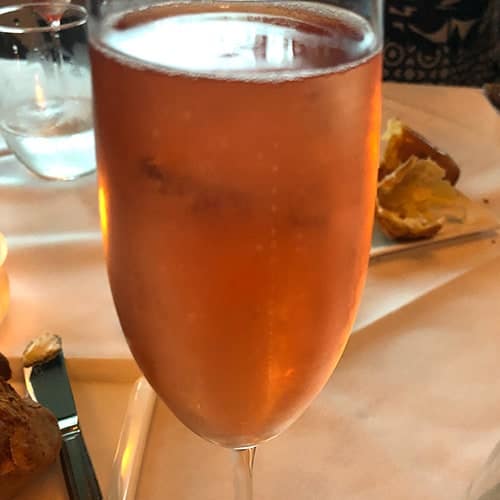 glass of sparkling rosé wine