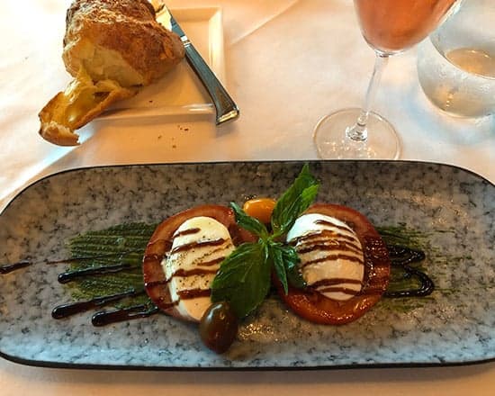 presentation of Caprese salad at Strega Prime restaurant