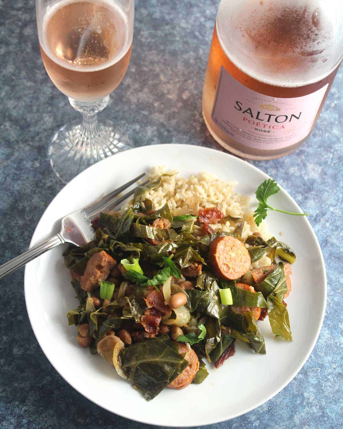 Brazilian Beans, Greens and Bacon served with sparkling wine.