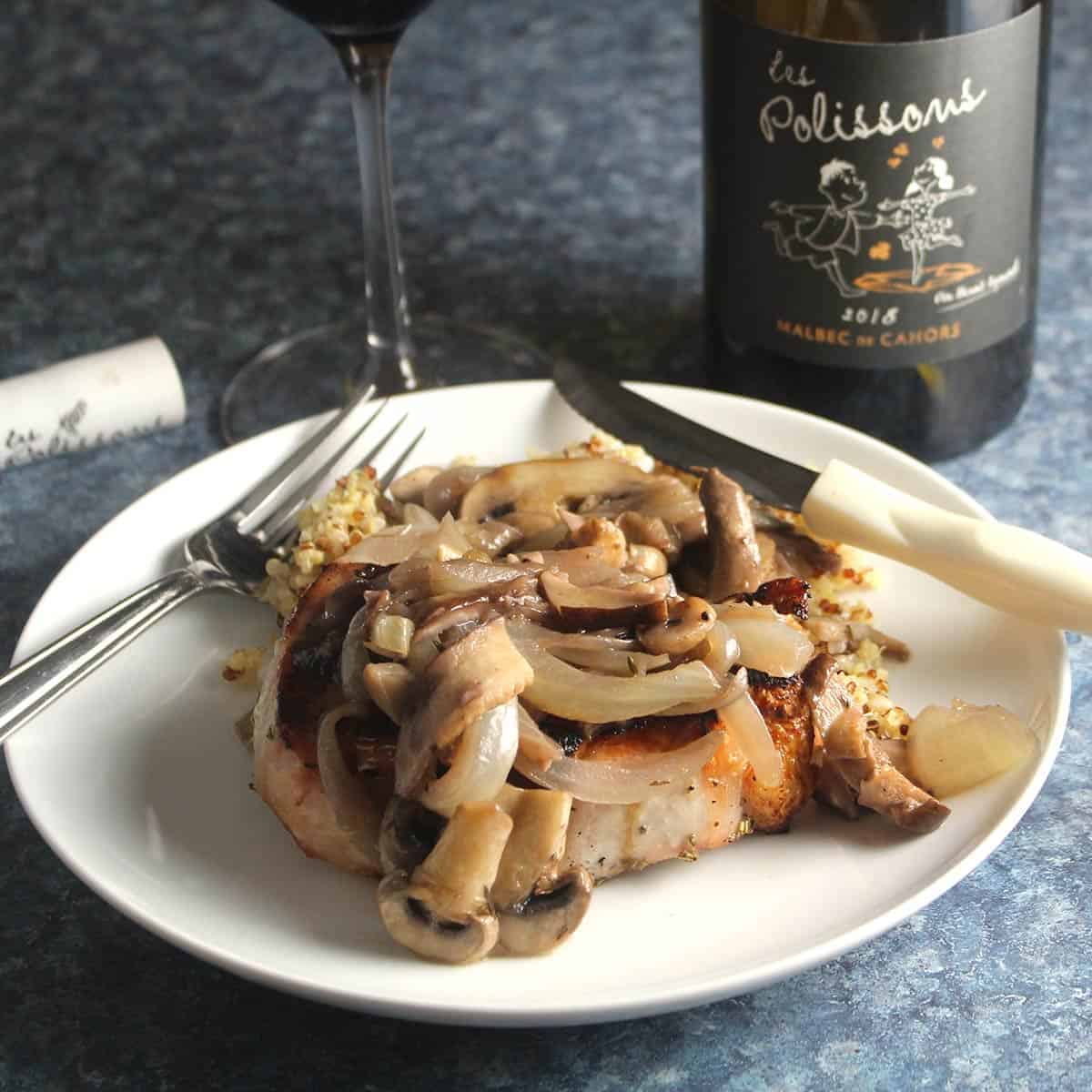 pork chops with mushroom sauce and a red wine