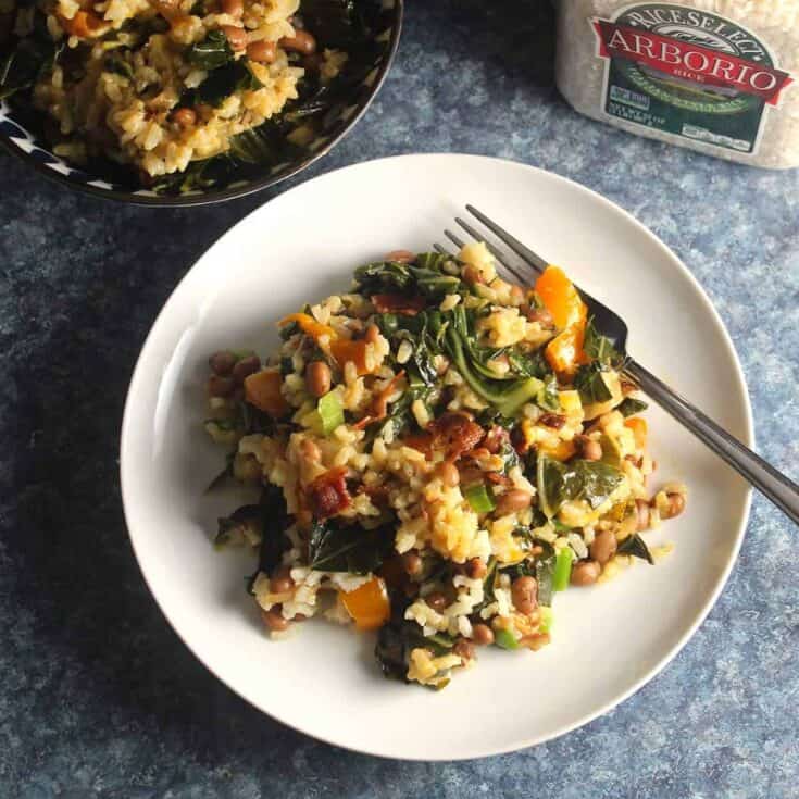 Hoppin' John Risotto on a white plate.