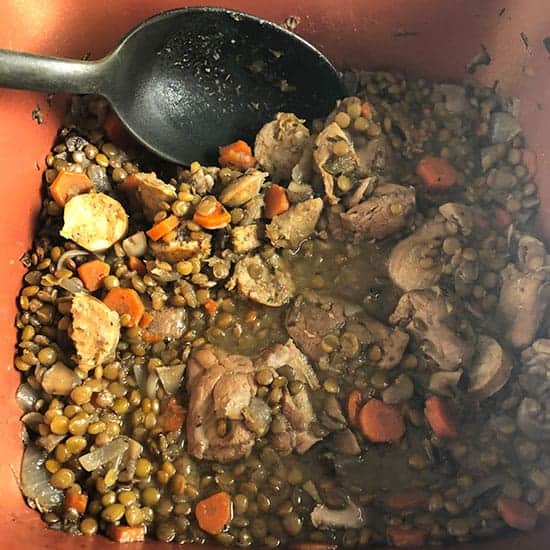 making chicken and lentil stew