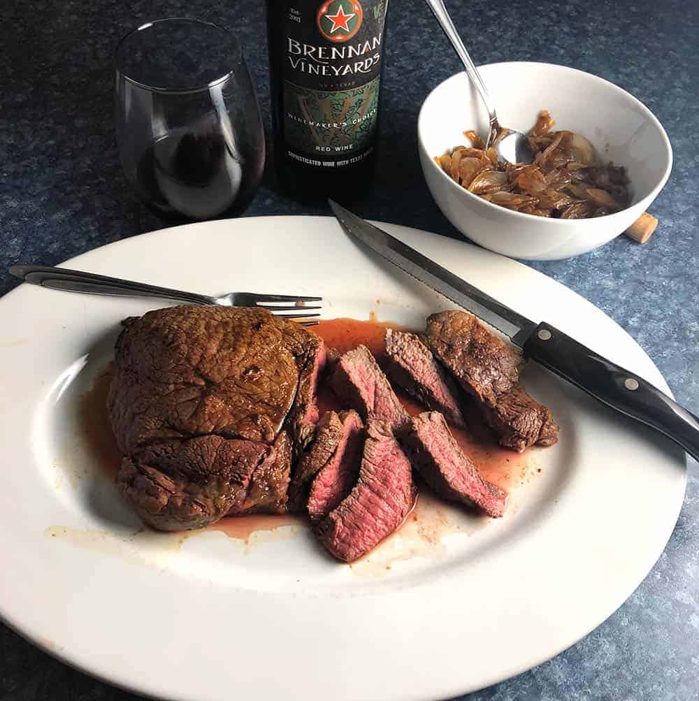 oven roasted sirloin steak with onion sauce and Texan red wine
