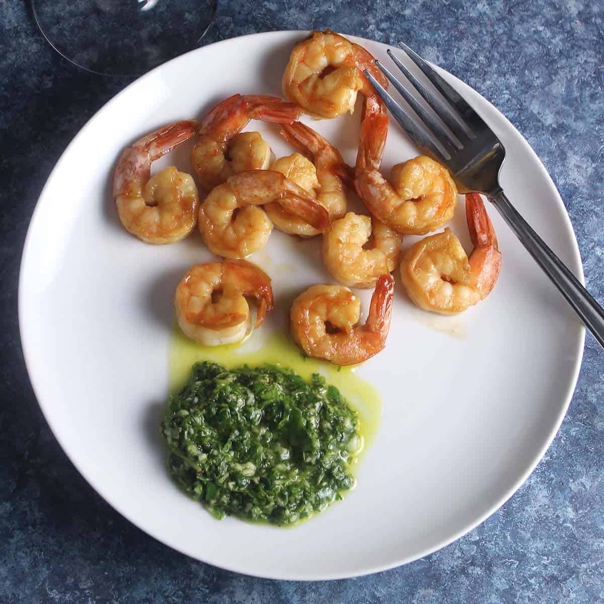 shrimp plated with cilantro dipping sauce