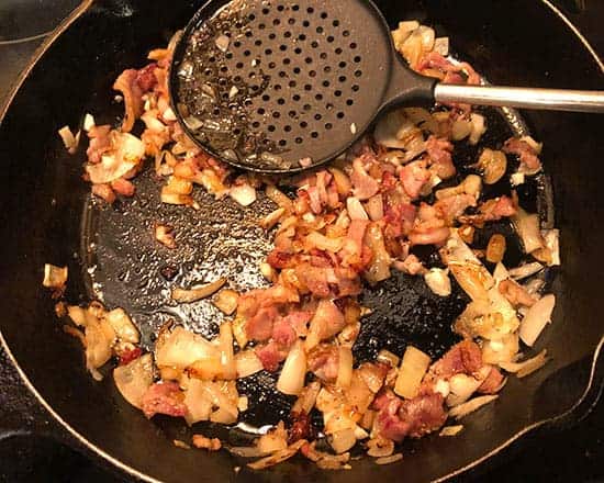 bacon and onions in a skillet