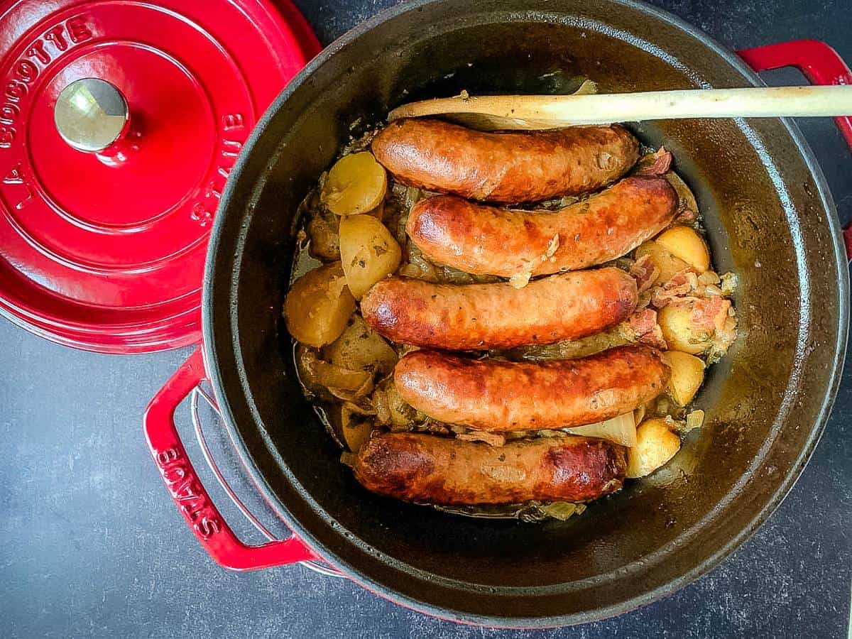 dublin coddle, with sausages cooked in the pot, ready to serve.