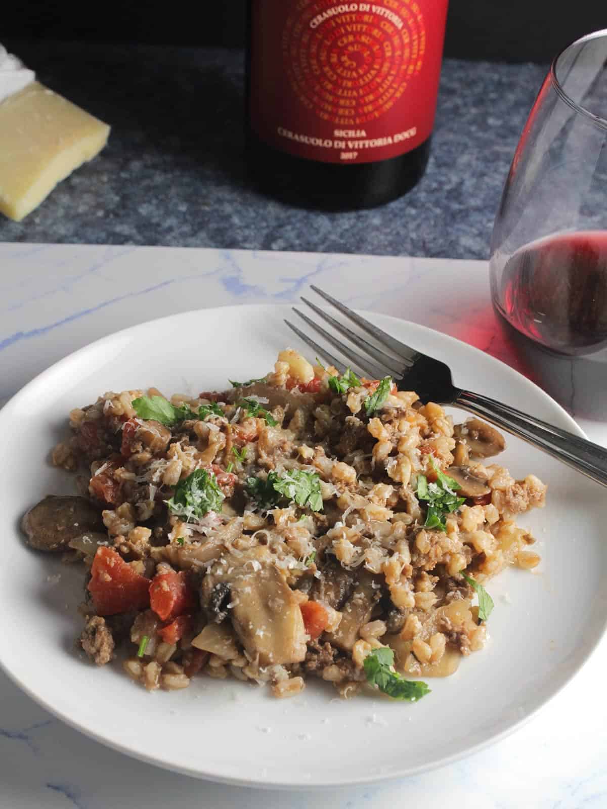 Sicilian red wine with farro dish.