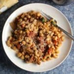 elbow macaroni with a ground beef sauce with tomatoes and chickpeas.