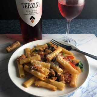 vegetarian sausage pasta paired with a cerasuolo rosé wine