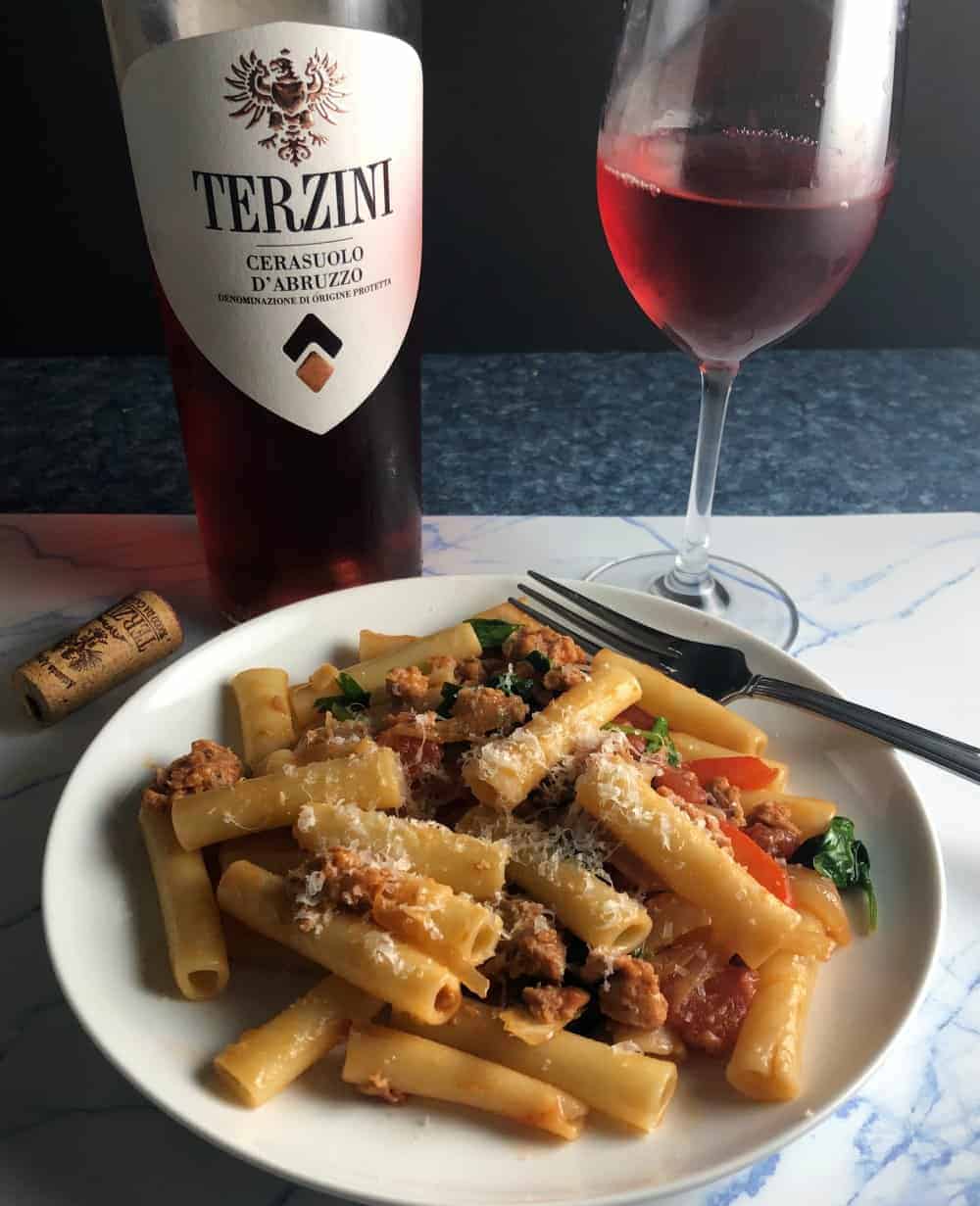 pasta dish served with a rosé wine.