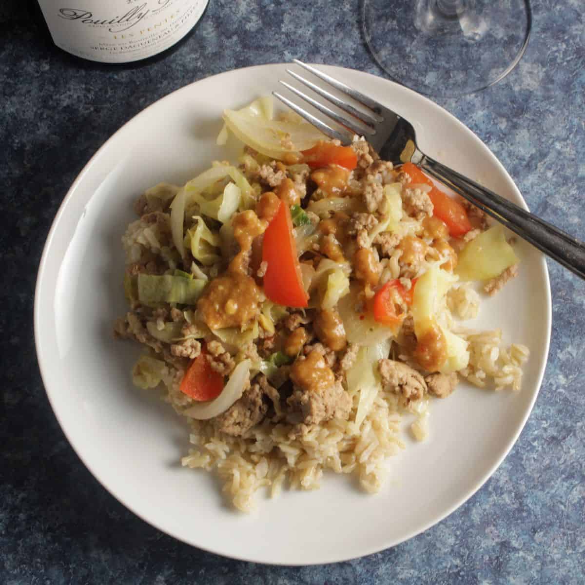 turkey cabbage skillet on a white plate.