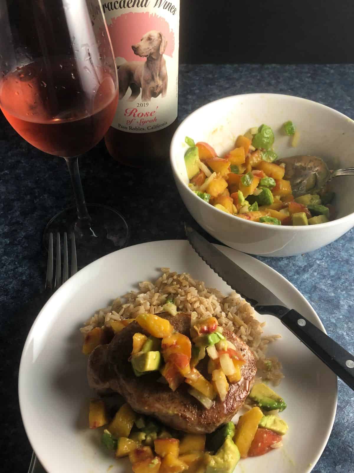 pork chops paired with peach salsa paired with a rosé wine.