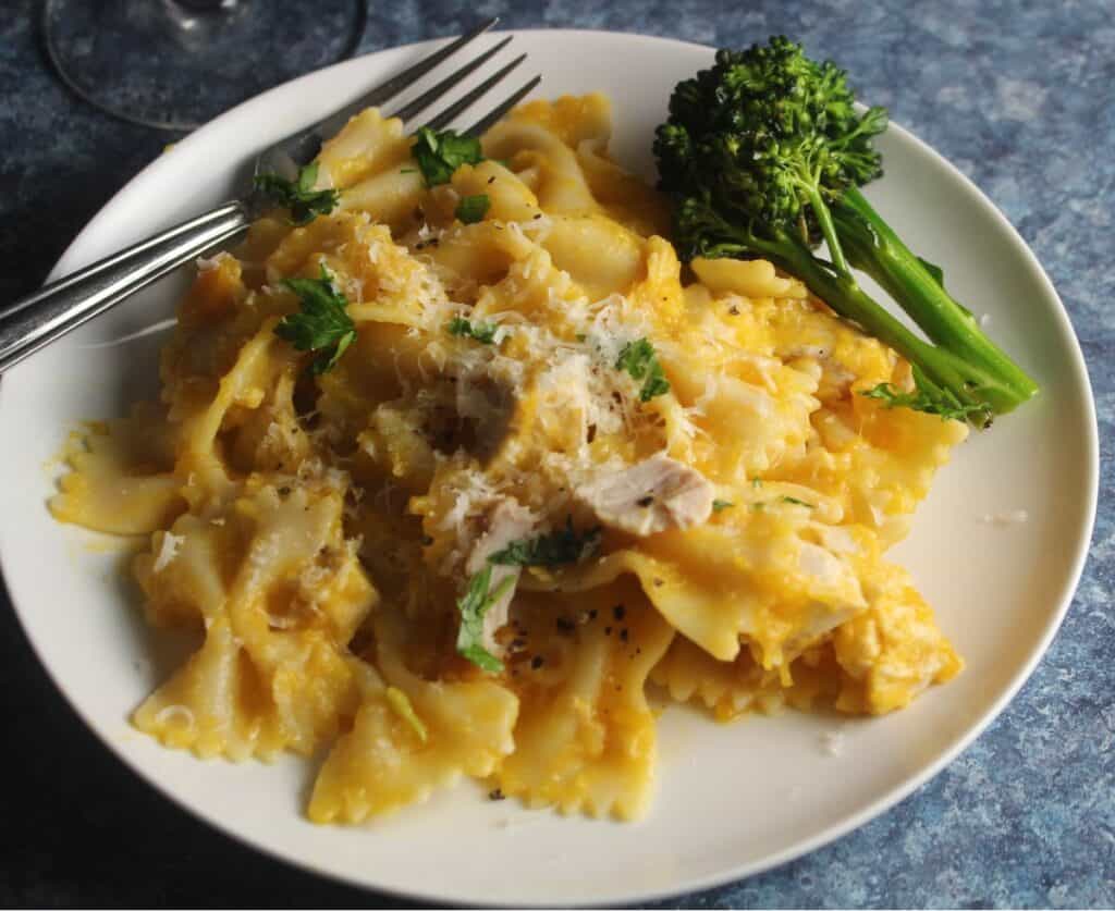 leftover butternut squash pasta served on a white plate.