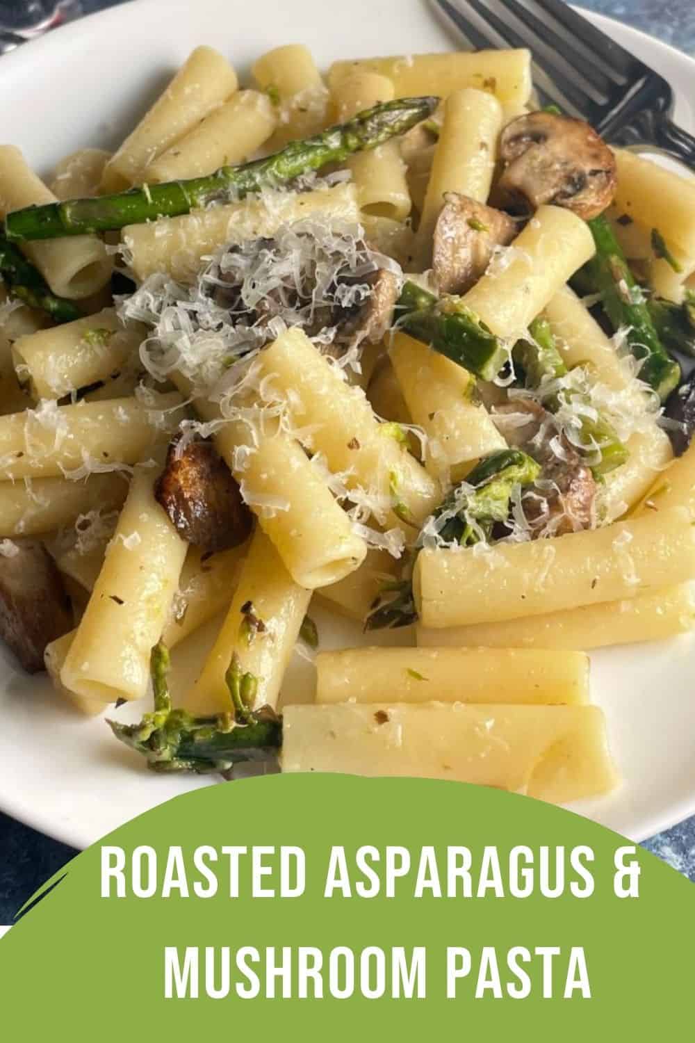 closeup photo of asparagus and mushrooms tossed with ziti.