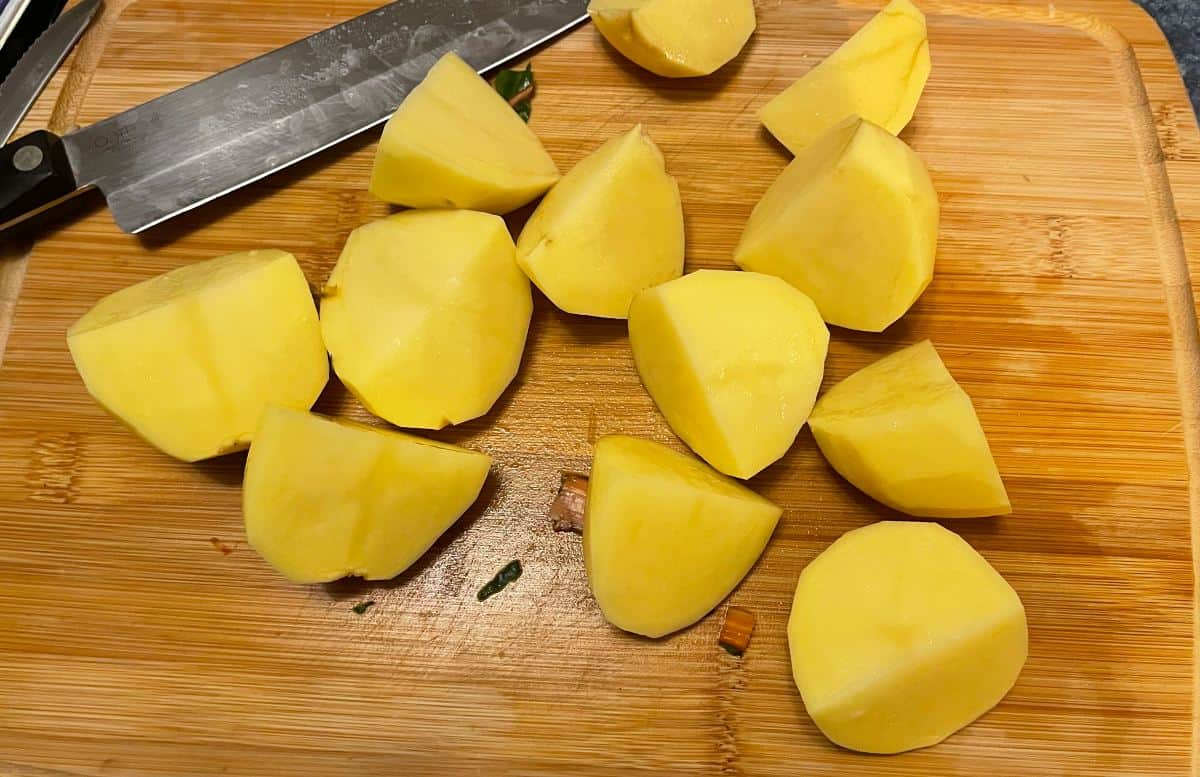 chopped potatoes on a cutting board.