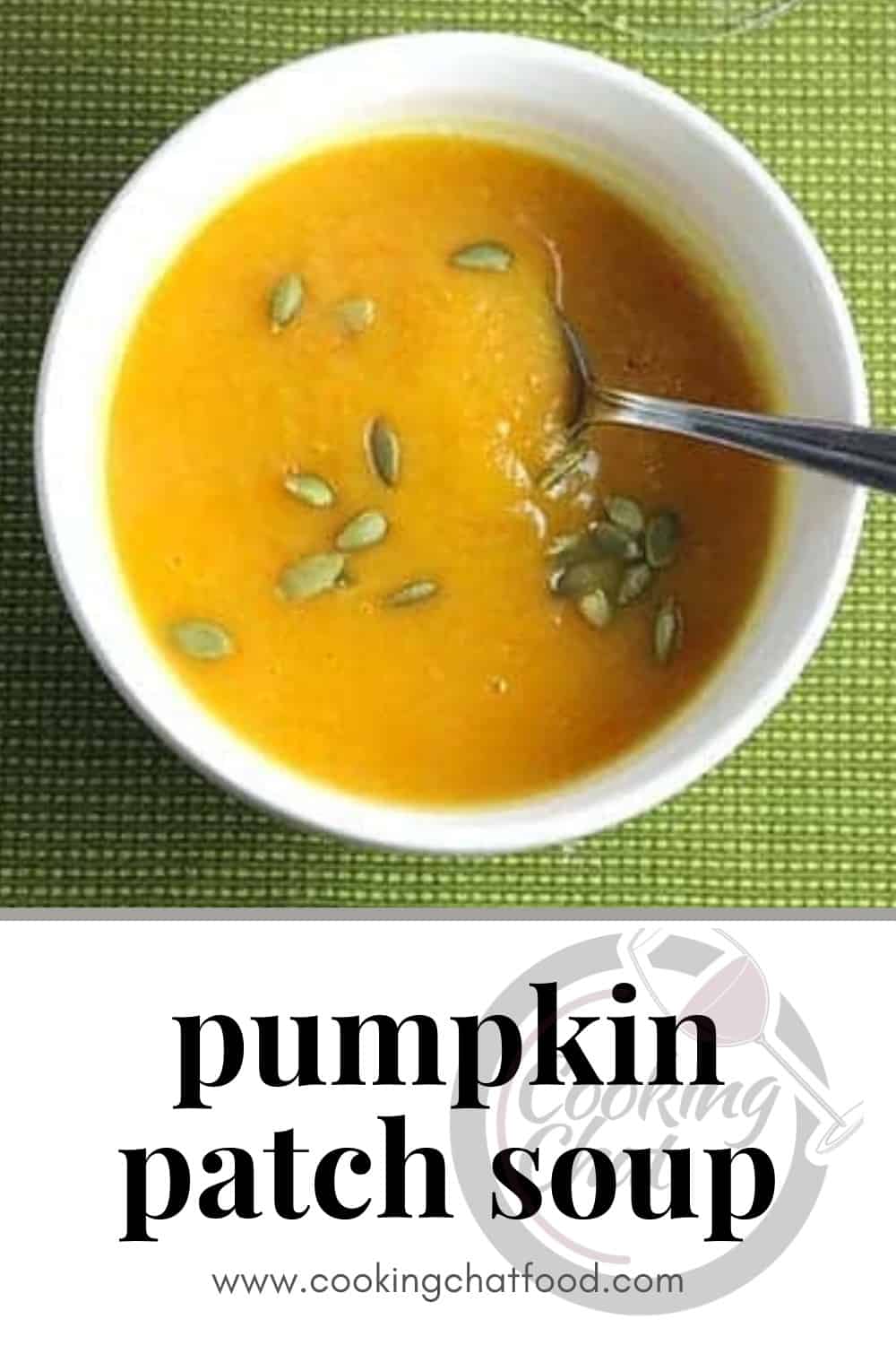 pumpkin soup in a white bowl, topped with pumpkin seeds