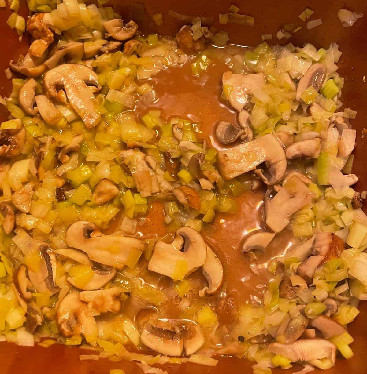 cooking mushrooms with leeks, for braised chicken recipe.