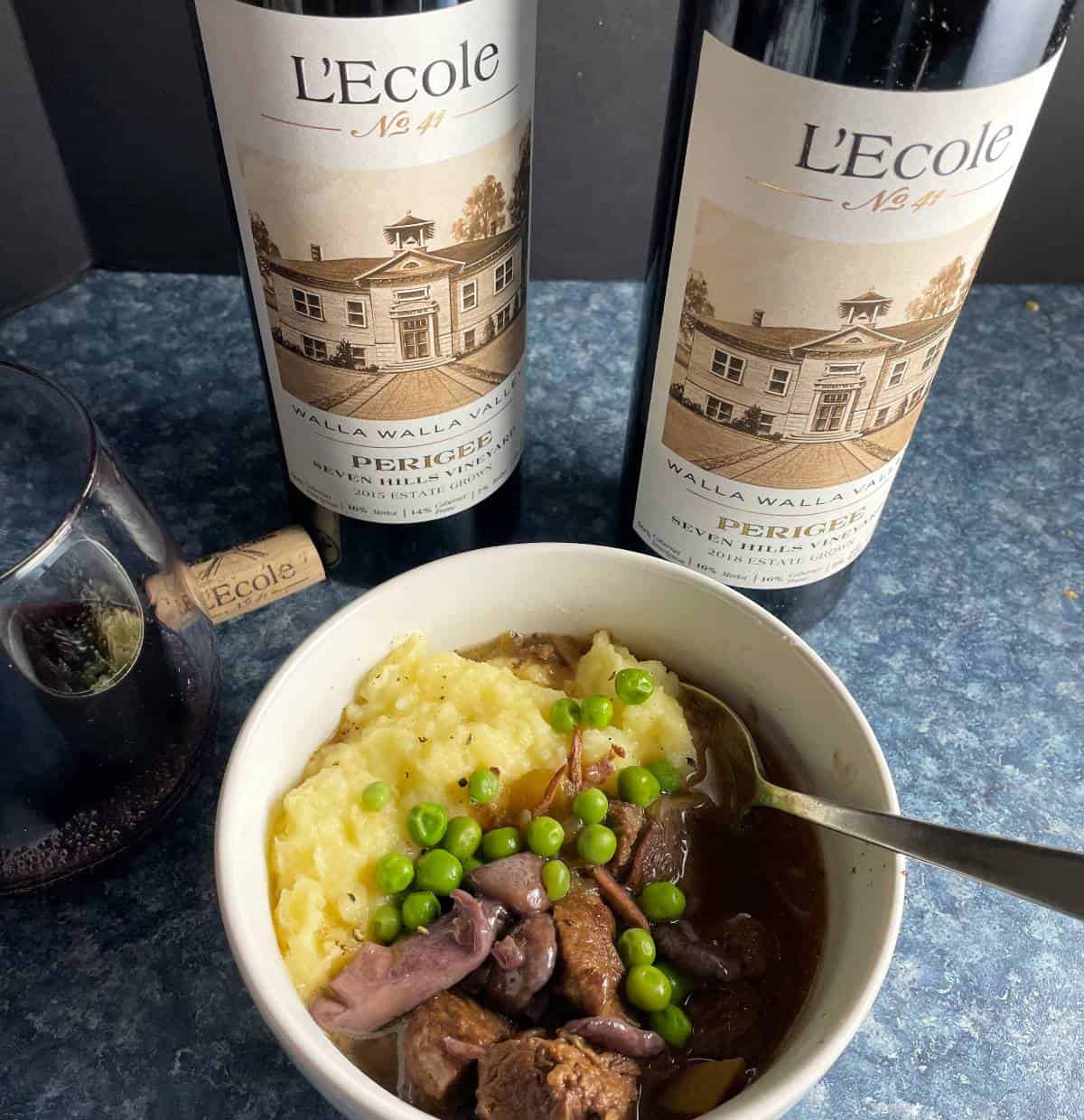 Two bottles of L'Ecole Perigree, paired with beef stew.