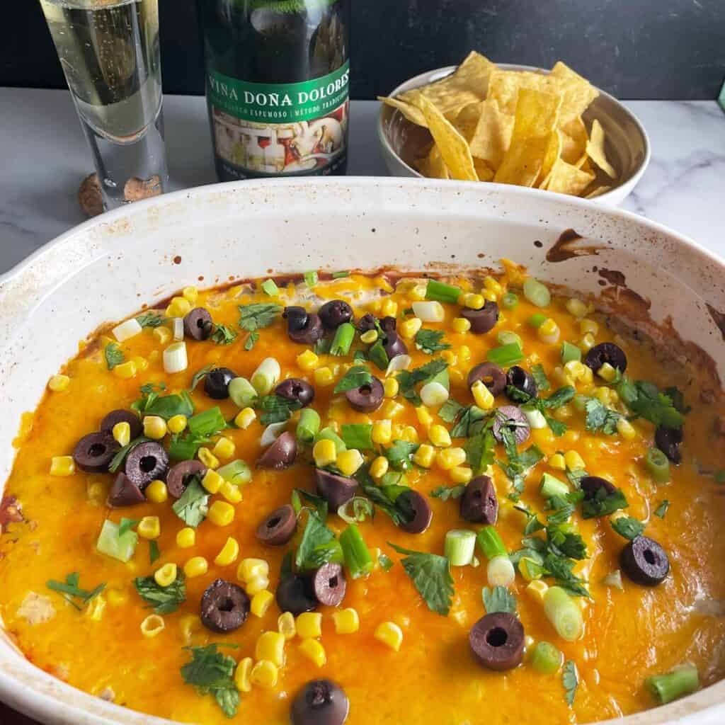 Baked Fiesta Dip with Mexican Bubbly - Cooking Chat