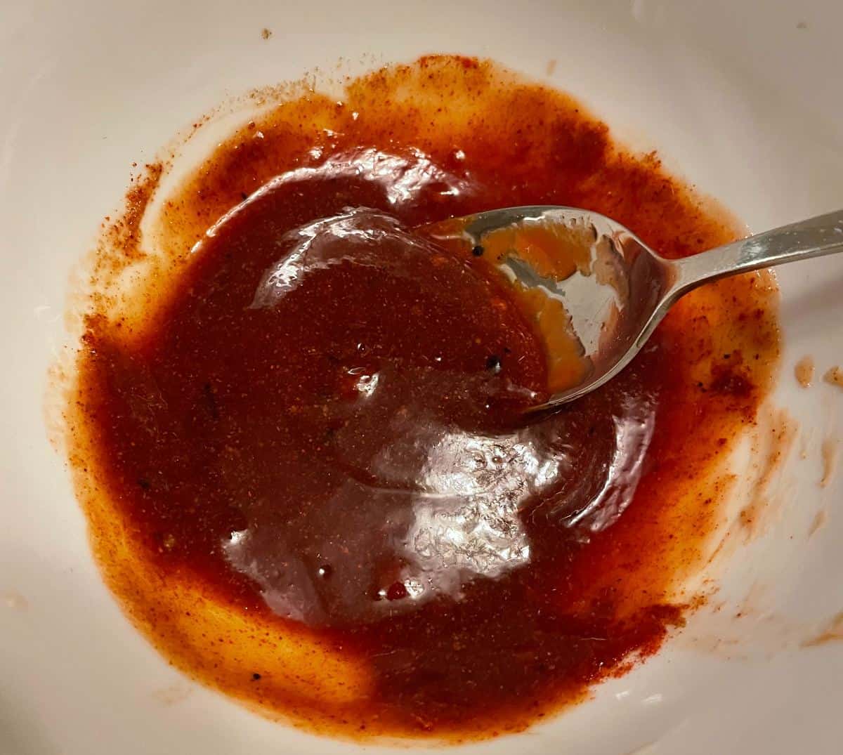 barbecue marinade in a white bowl.