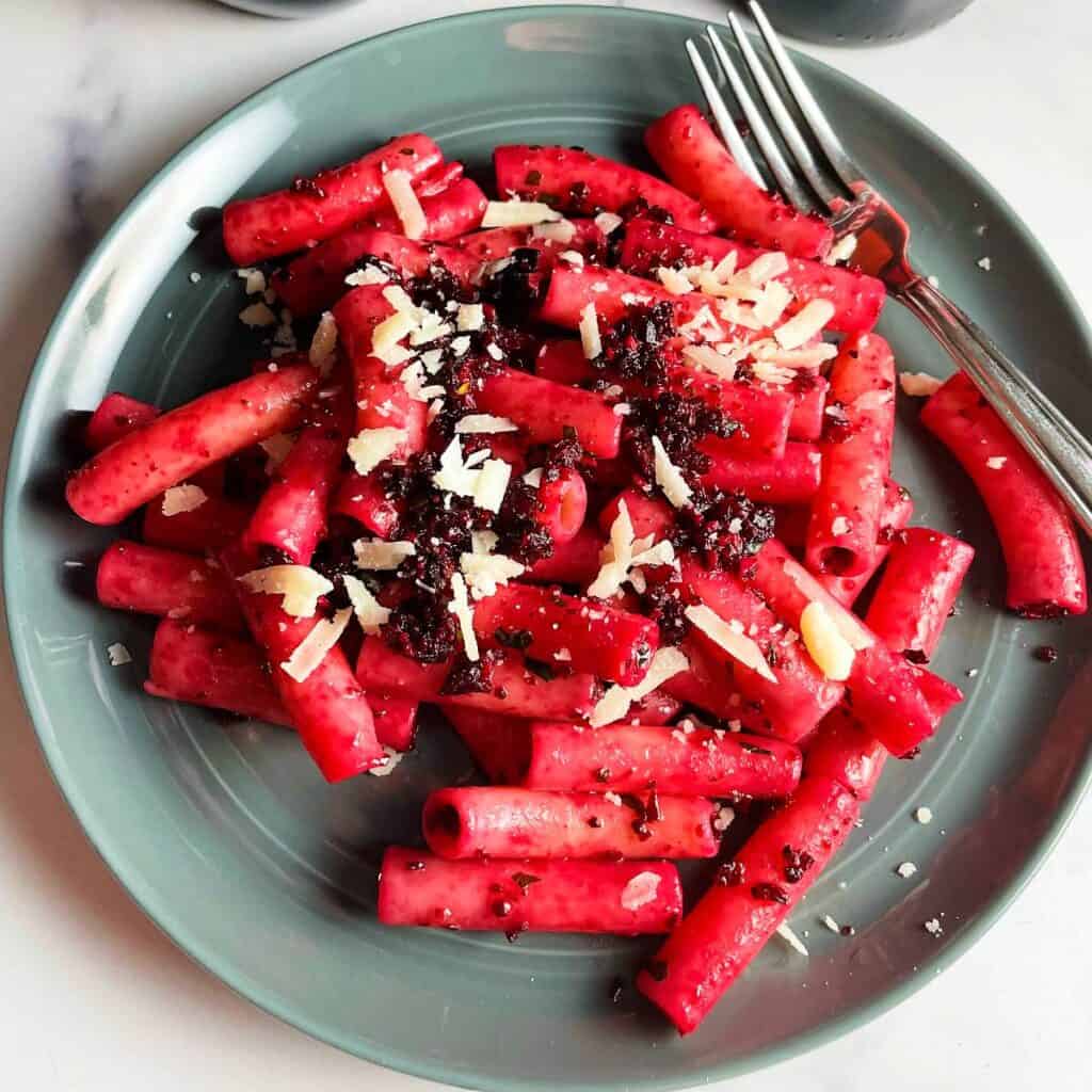 roasted beet pesto on a turquoise plate