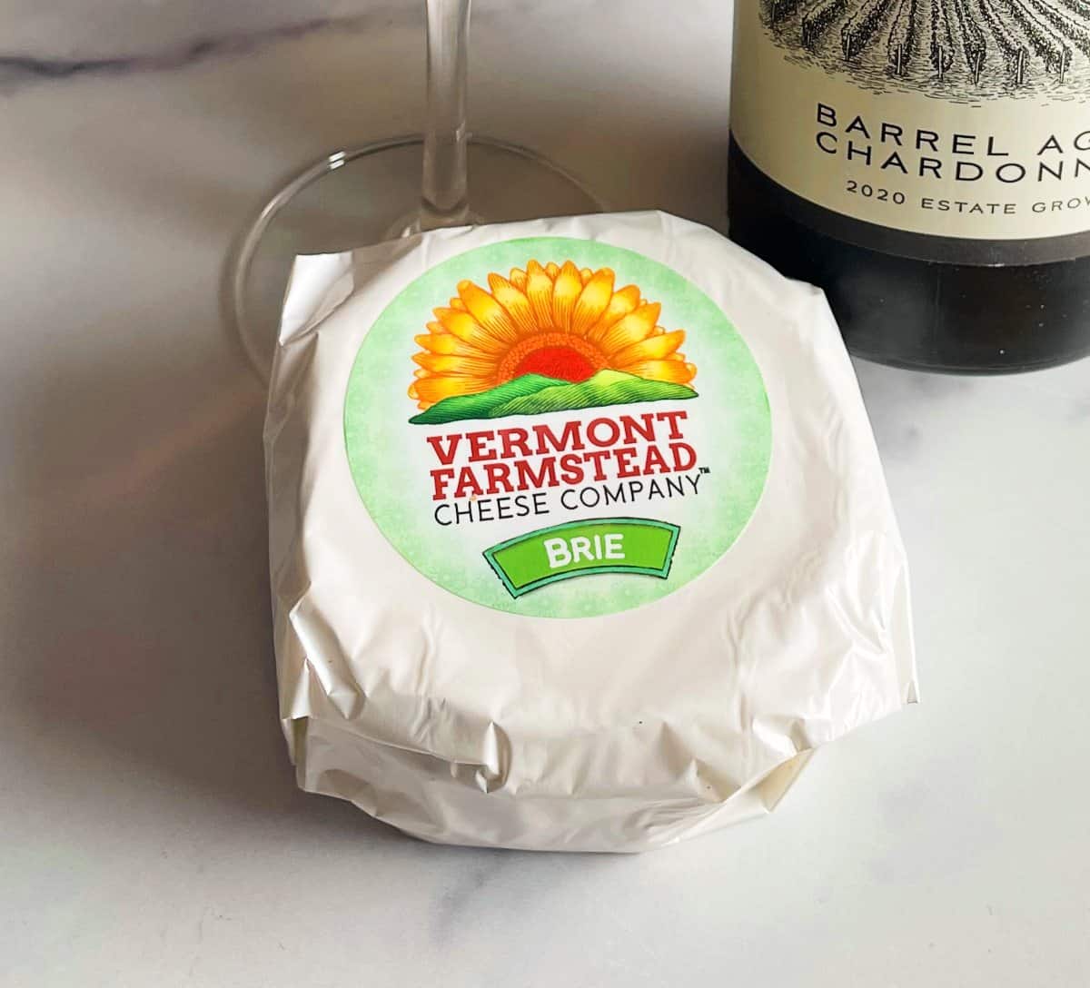an unopened package of Vermont Farmstead Brie.