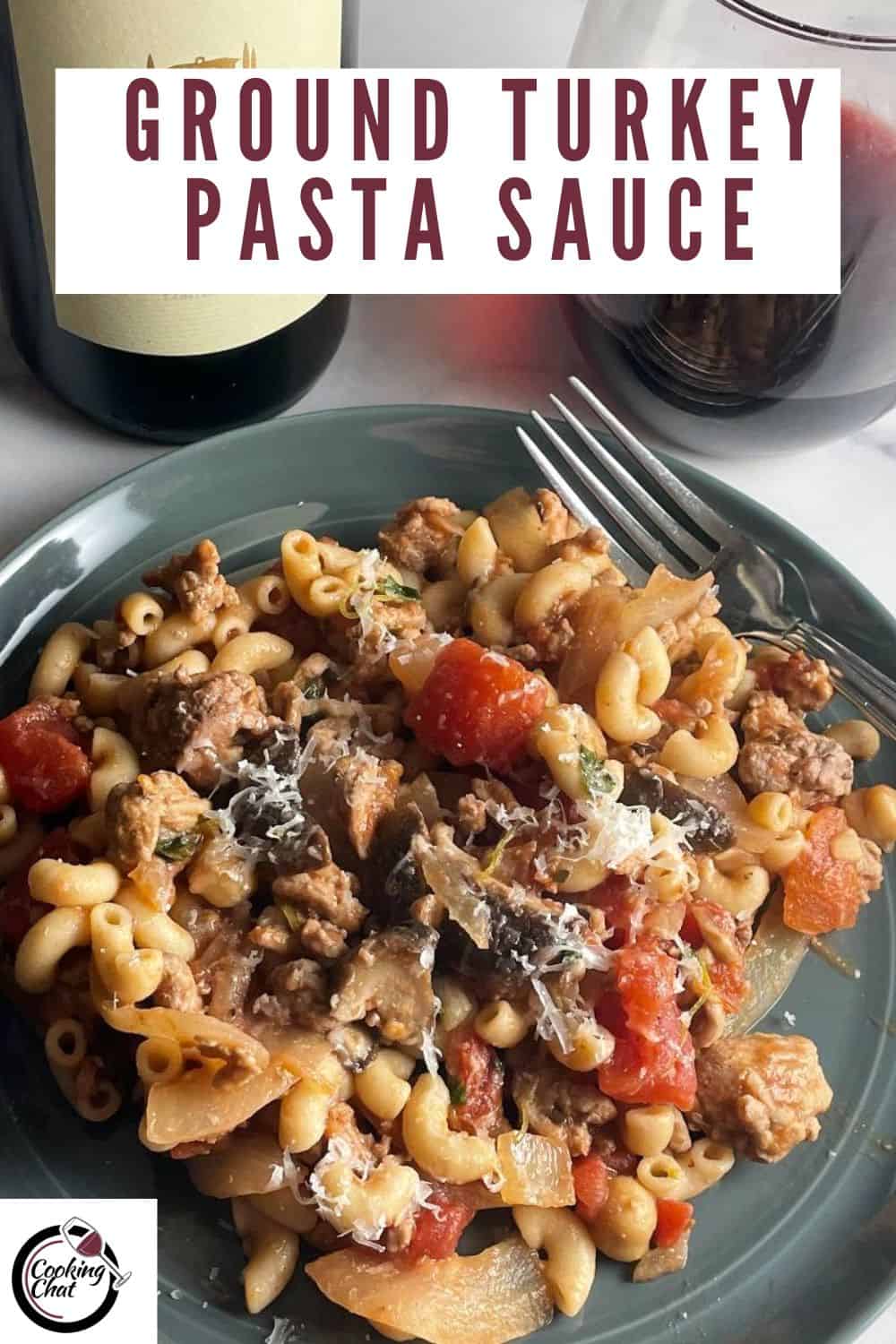 ground turkey pasta with mushrooms on a dark gray plate. Text with recipe title "Ground Turkey Pasta Sauce" at the top.