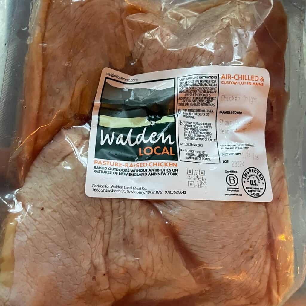 package of Walden bone-in chicken thighs.