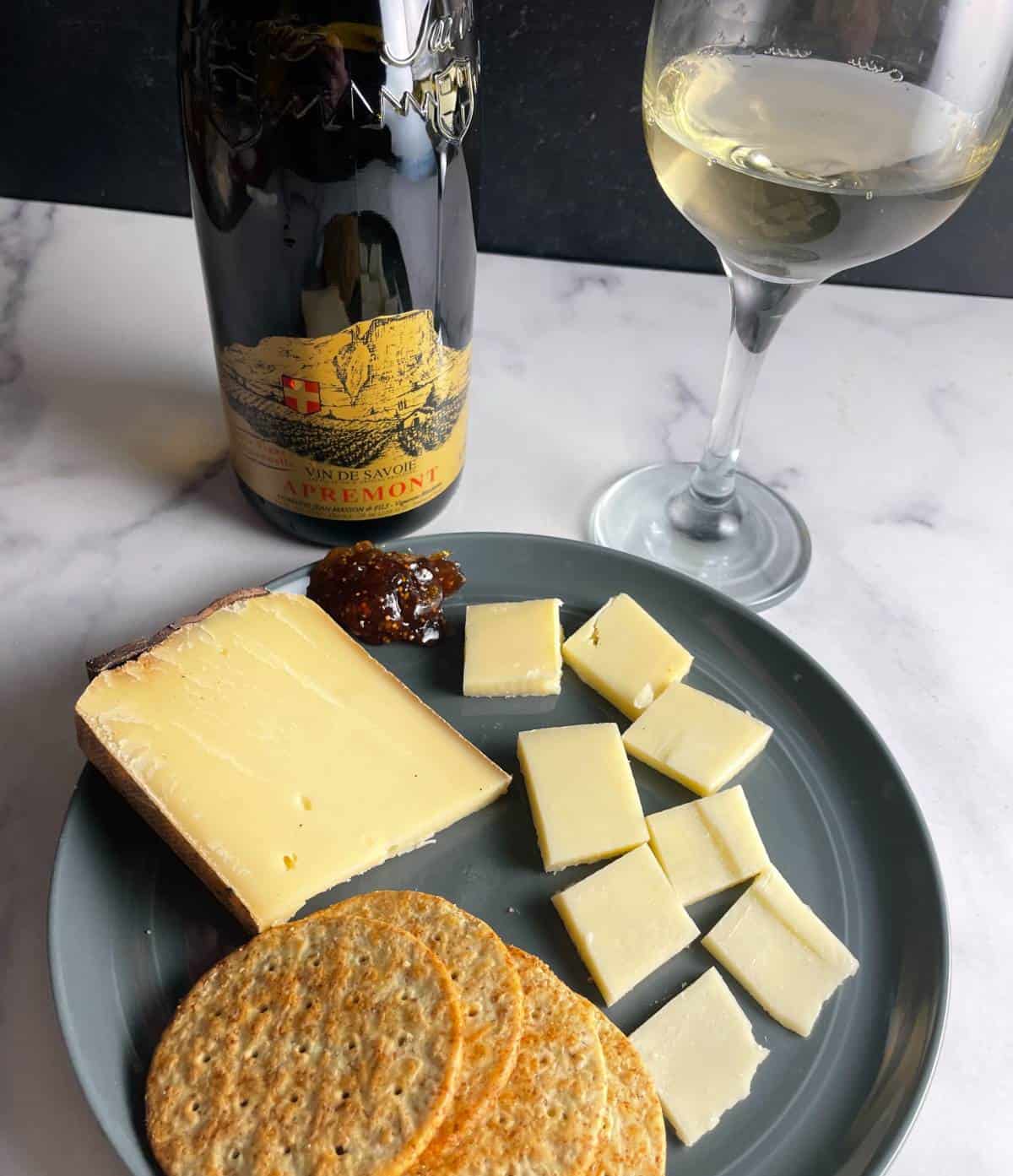 Cheese plate served with Apremont white wine.