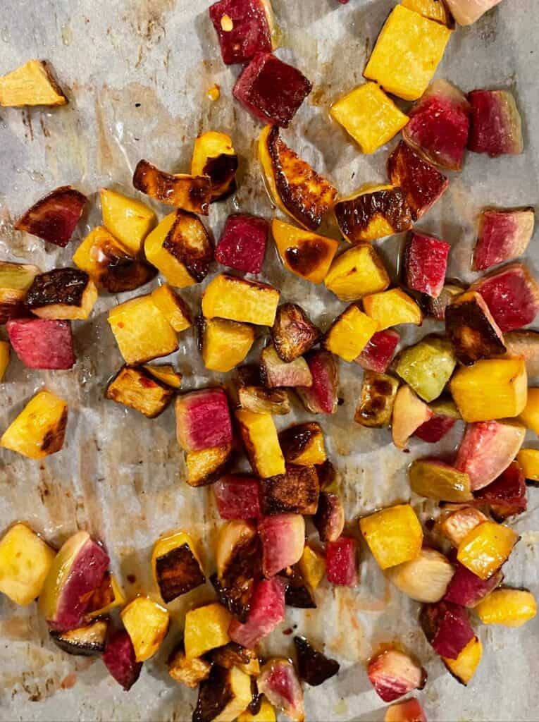roasted root vegetables on a baking sheet