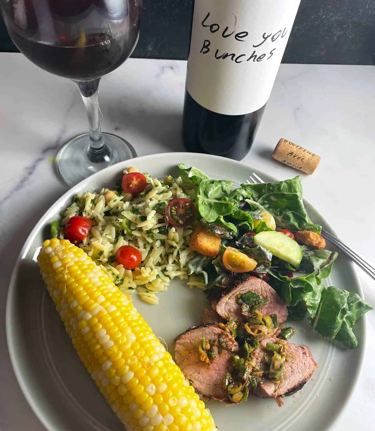 a summer spread served with a chillable red wine.