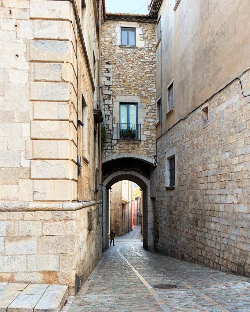 cobblestone street in Girona, Spain.