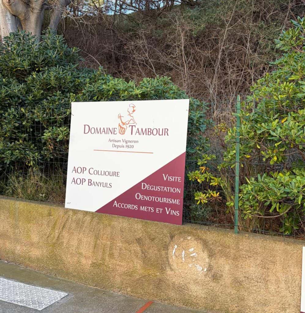 an outdoor sign for Domaine Tambour.
