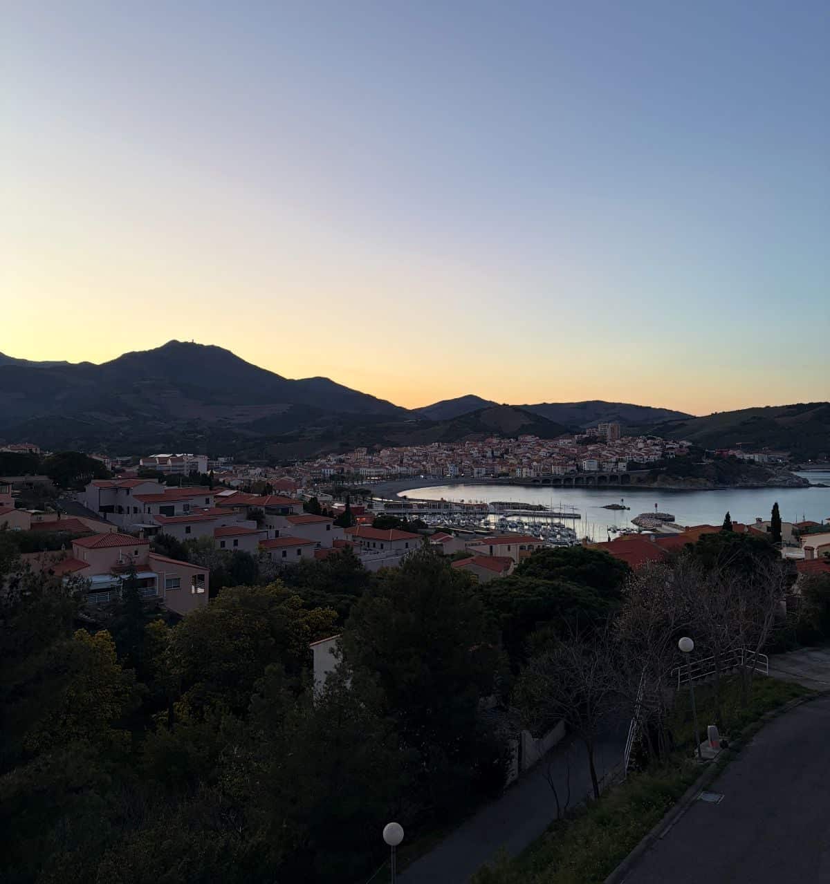 twilight view of the town and harbor in Banyuls-sur-Mer.