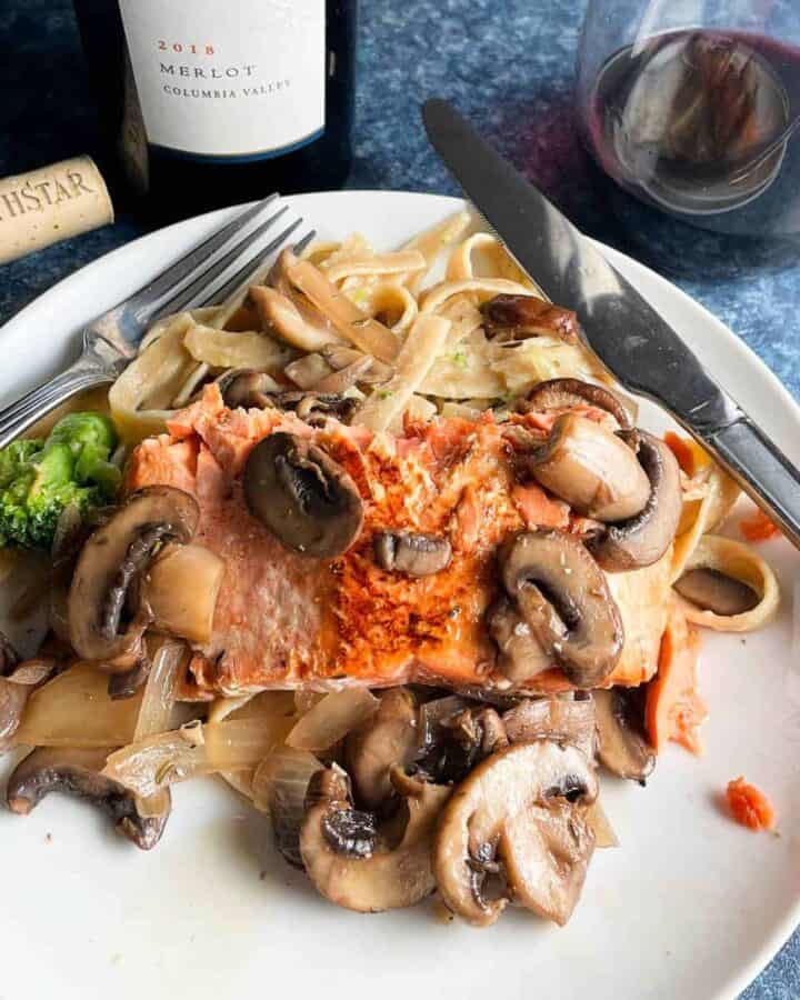 salmon served with mushrooms.