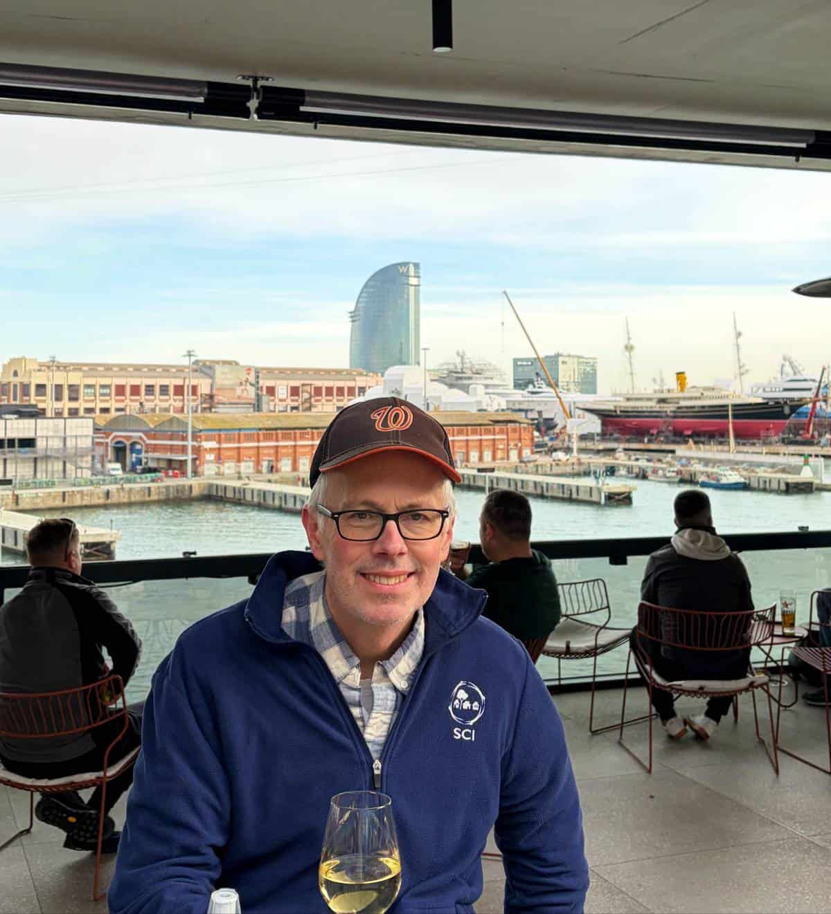 David B. Crowley enjoying a glass of Albarino near the Barcelona waterfront.