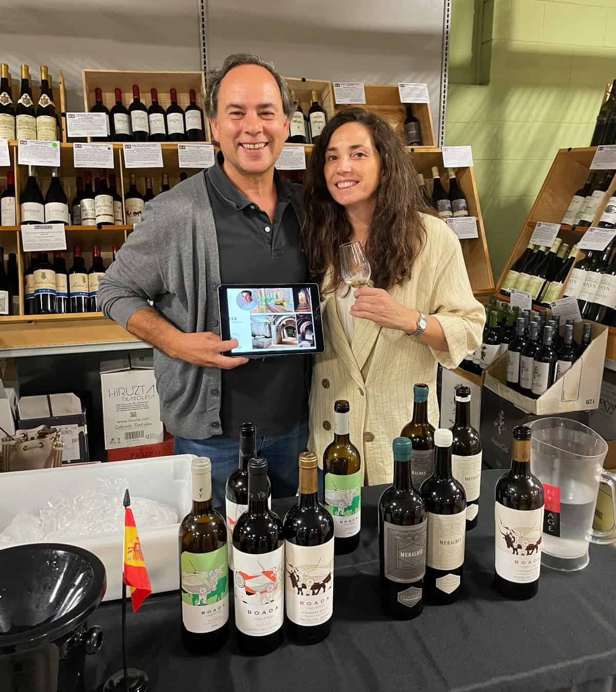 winery representatives at their table during a tasting event.