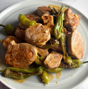spanish pork and peppers, plated.
